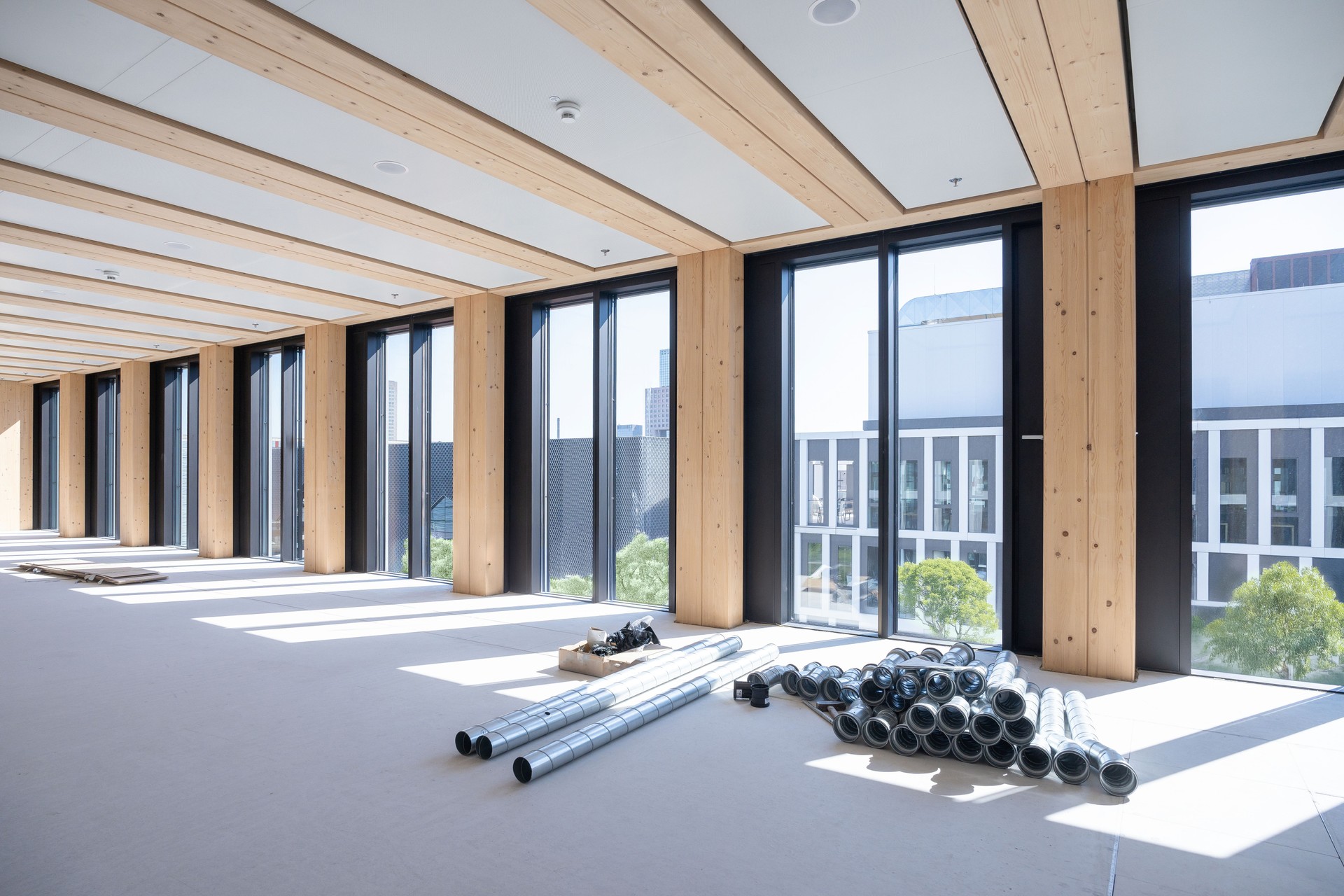 construction site of a sustainable Timber-concrete composite office building